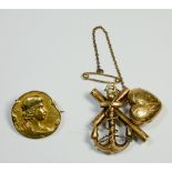 Victorian 15 ct gold naval sweetheart brooch with heart shaped locket compartment together with a