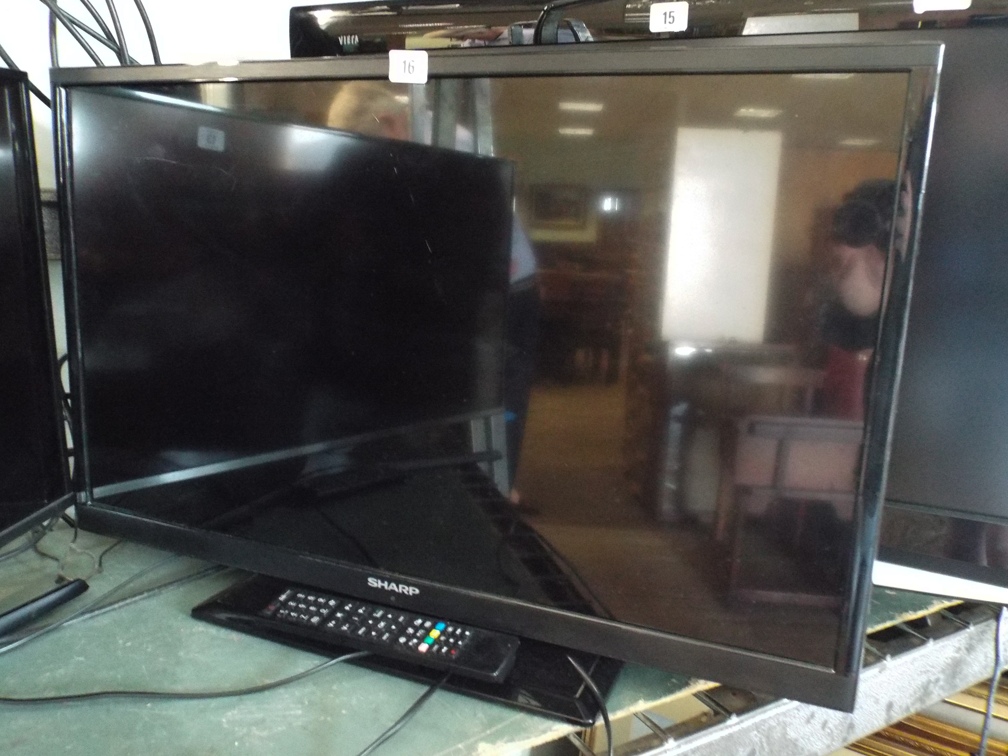 A Sharp 32" digital LCD TV with freeview etc