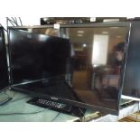 A Sharp 32" digital LCD TV with freeview etc