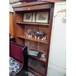 A walnut finished open bookcase approx 4' wide