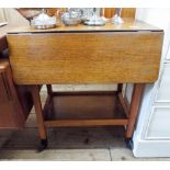 A two tier oak drop leaf tea trolley