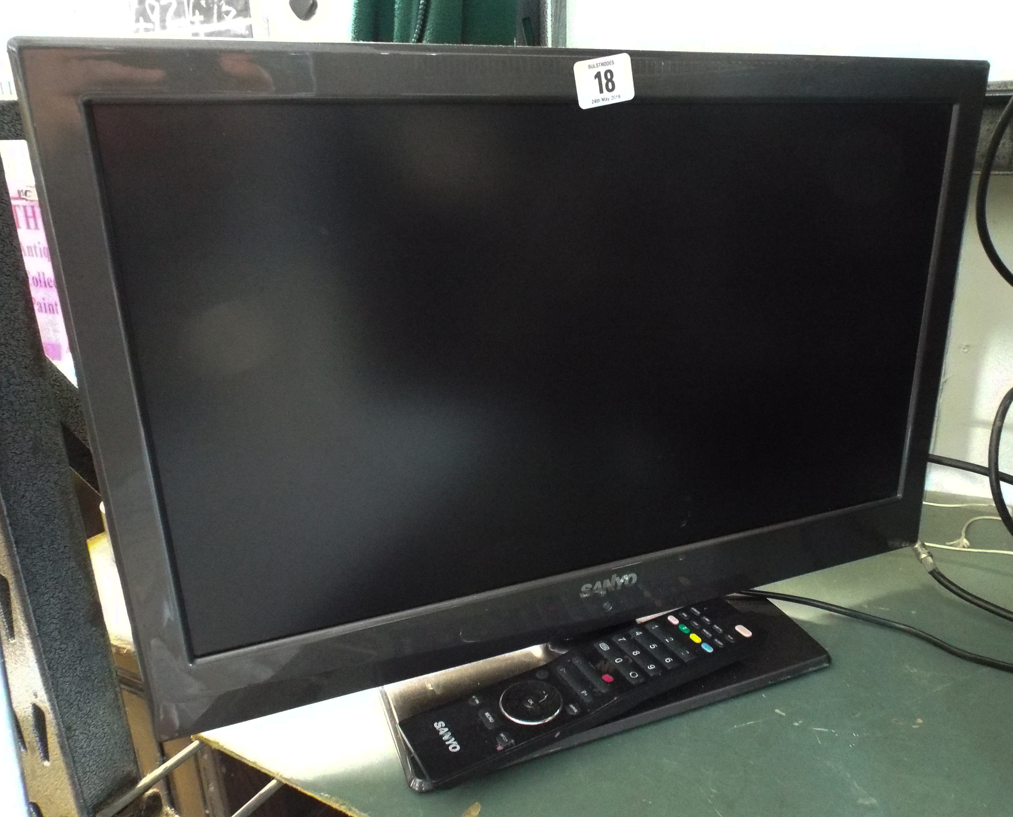 A Sangyaw 22" slimline digital LCD TV with freeview etc