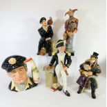 A collection of five Royal Doulton figurines and character jugs to include The Jester and The