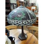 A Tiffany style electric table lamp with shade