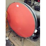 A 1970's retro, circular, heater with pink case In reasonable condition for age,