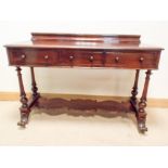 A Victorian mahogany side table fitted three draws with under tier,