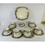 A Royal Albert Crown china Art Deco tea set decorated with a geometric design in silver and black