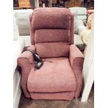 Electric reclining easy chair in pink mottled material