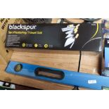 A new 5 piece bricklayers and plasters trowel set and a 3' spirit level