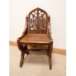 A church Gothic style carved oak chair