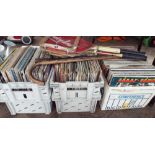 Three large boxes of LP vinyl records, walking stick,