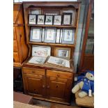 A varnished pine kitchen dresser