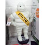 A painted Michelin man advertising figure ornament 16" tall