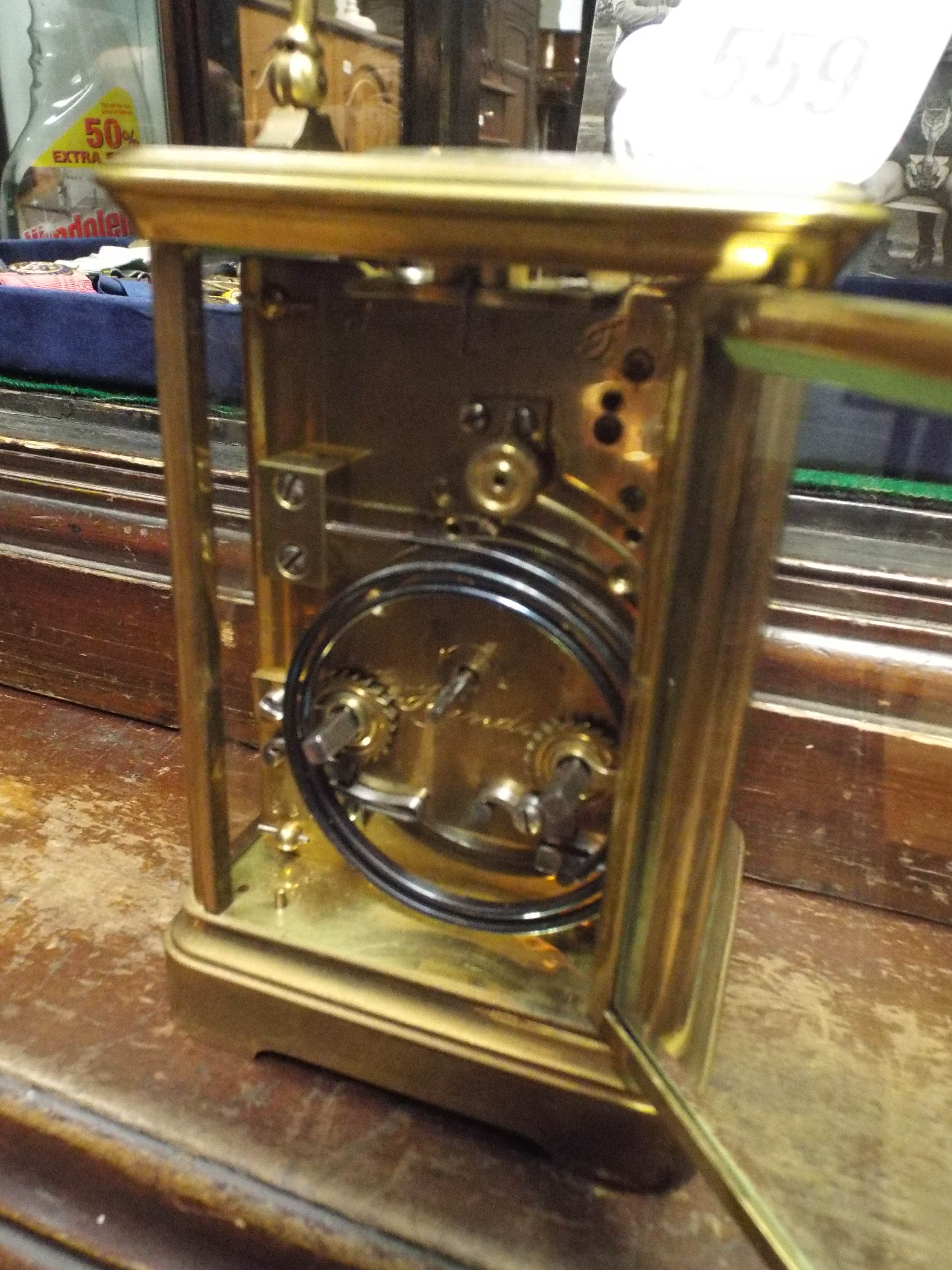 A gilt brass carriage clock with repeater mechanism, the white enamel dial signed E W Streeter, - Bild 3 aus 4