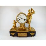 A French gilt bronze figure mounted clock,