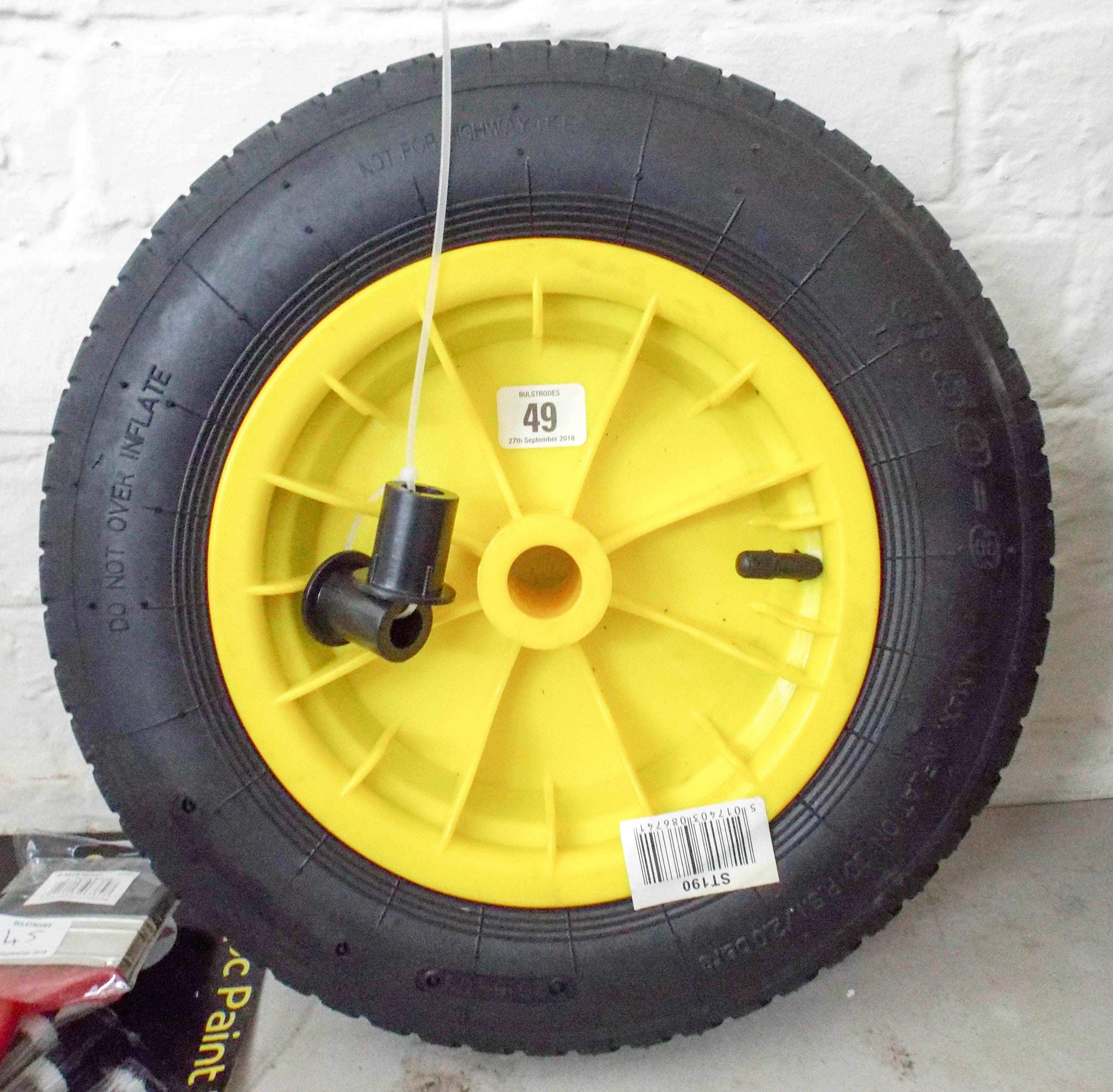 A new wheelbarrow wheel with spaces