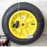 A new wheelbarrow wheel with spaces