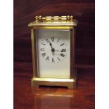 A French gilt brass carriage clock,