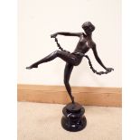 A contemporary bronze of a dancing lady signed on the base A Leonard on a marble plinth 20" tall