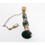 Victorian gilt metal watch fob set with oval moss agate panels