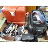 A Canon camera, Exakta camera, Yashica camera and other camera lenses etc,