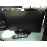 A 21" digital LCD TV with freeview etc and integrated DVD box with remote