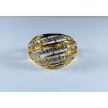 18ct yellow gold bombe dress ring set with four rows of brilliant cut diamonds, ring size Q,