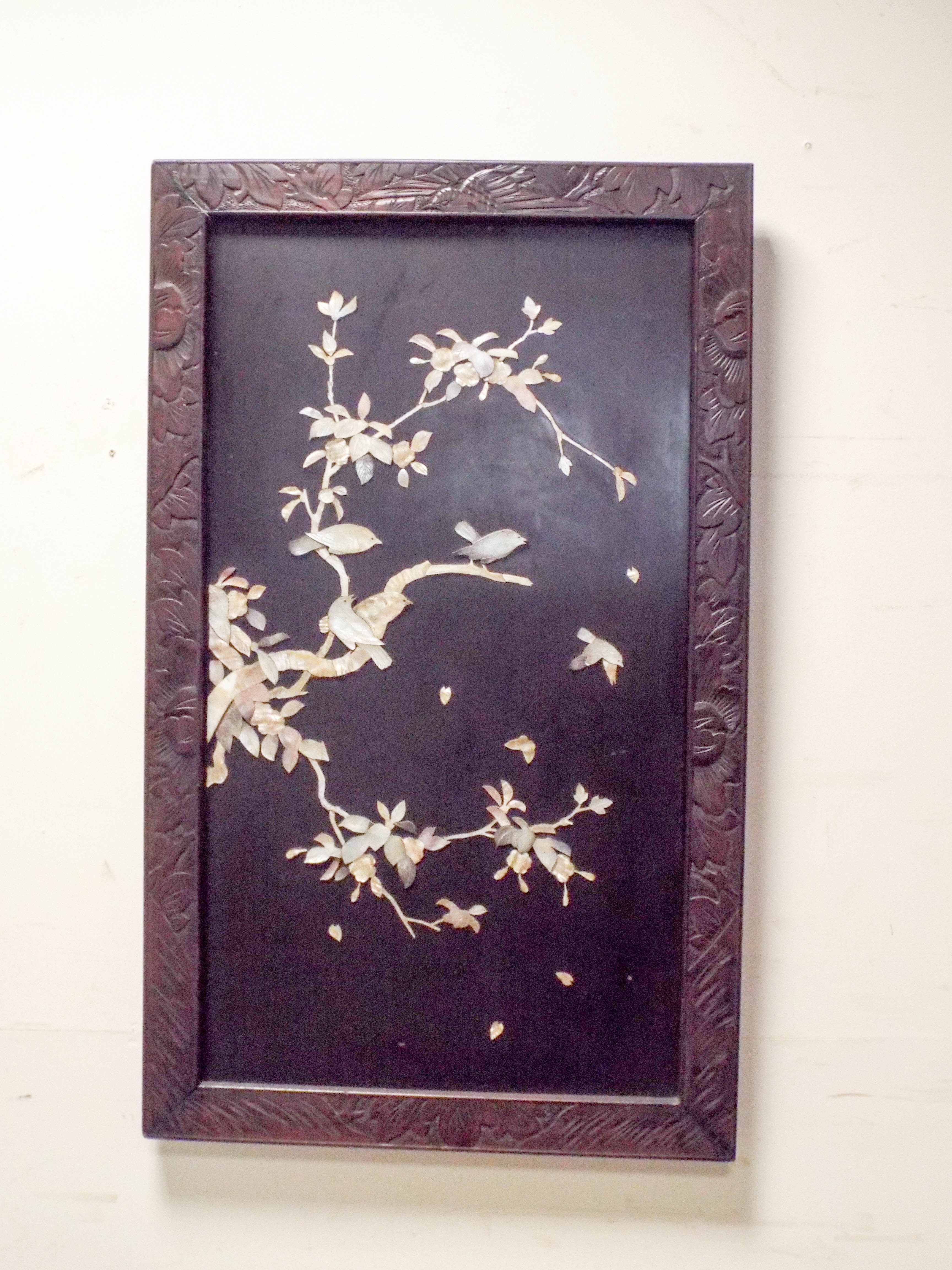 Pair of Japanese mother of pearl inlaid and decorated lacquer wall plaques