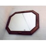 A 1930's cushion shaped wall mirror