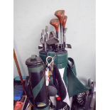 A green Spalding golf bag,