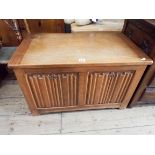 A small oak linen fold panel coffer