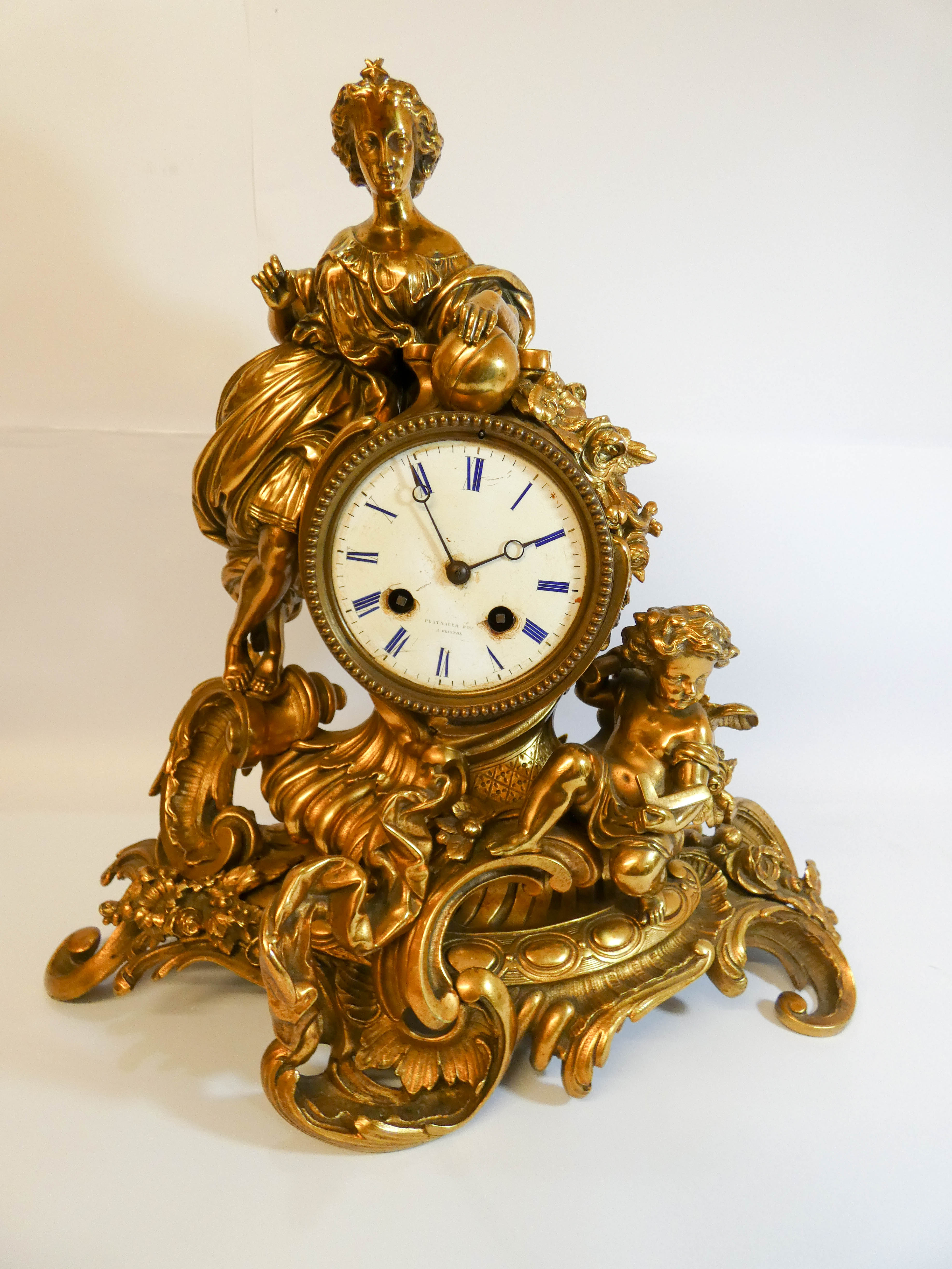 19th century French gilt bronze figure mounted mantel clock striking movement 16" tall