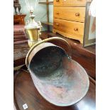 A decorative brass fluted table lam fitted with two swept handles approx 22" tall