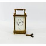 A 19th century brass carriage clock in a classically designed case with columns,
