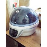 A very unusual Fagor space helmet shaped microwave oven