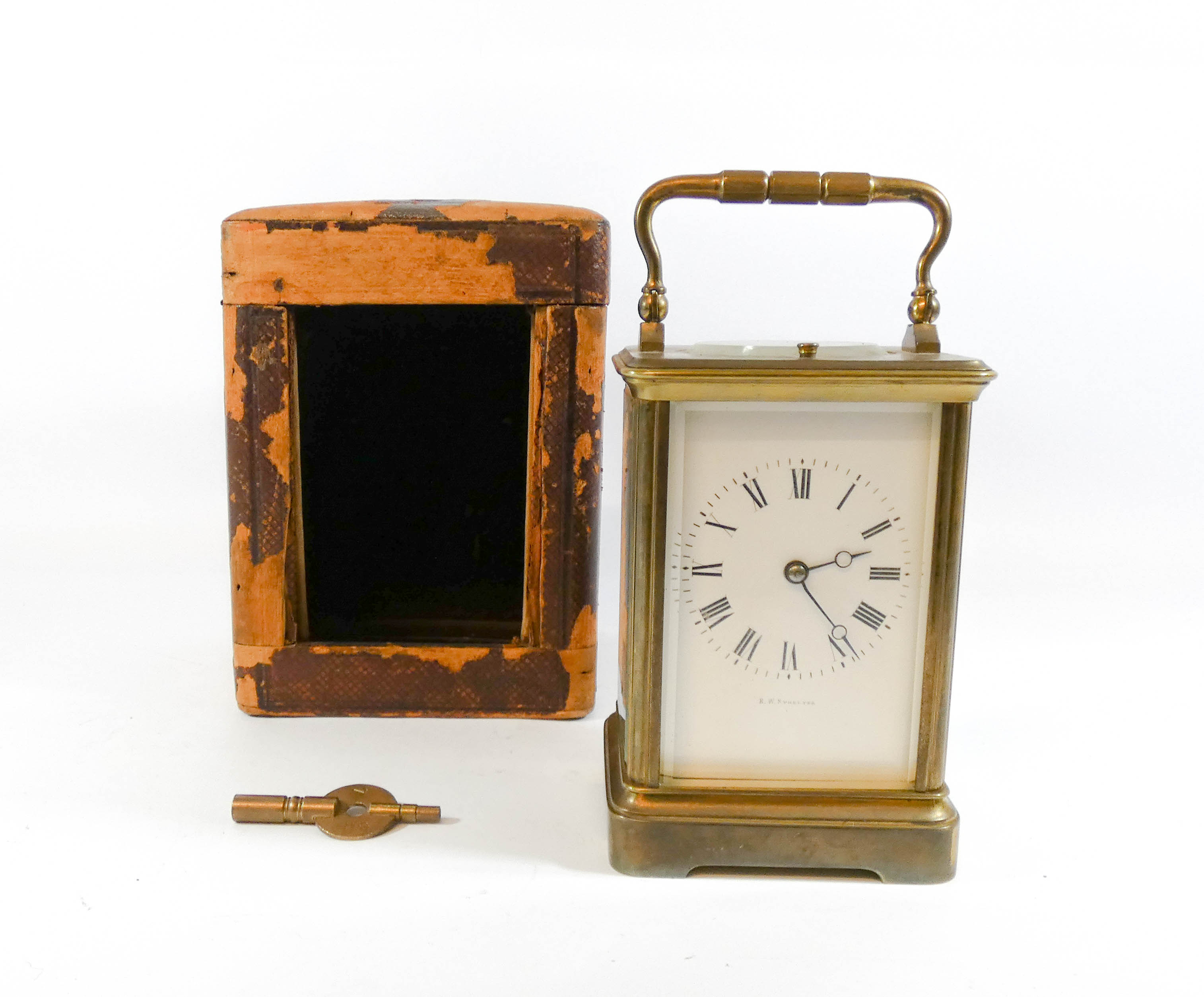 A gilt brass carriage clock with repeater mechanism, the white enamel dial signed E W Streeter,