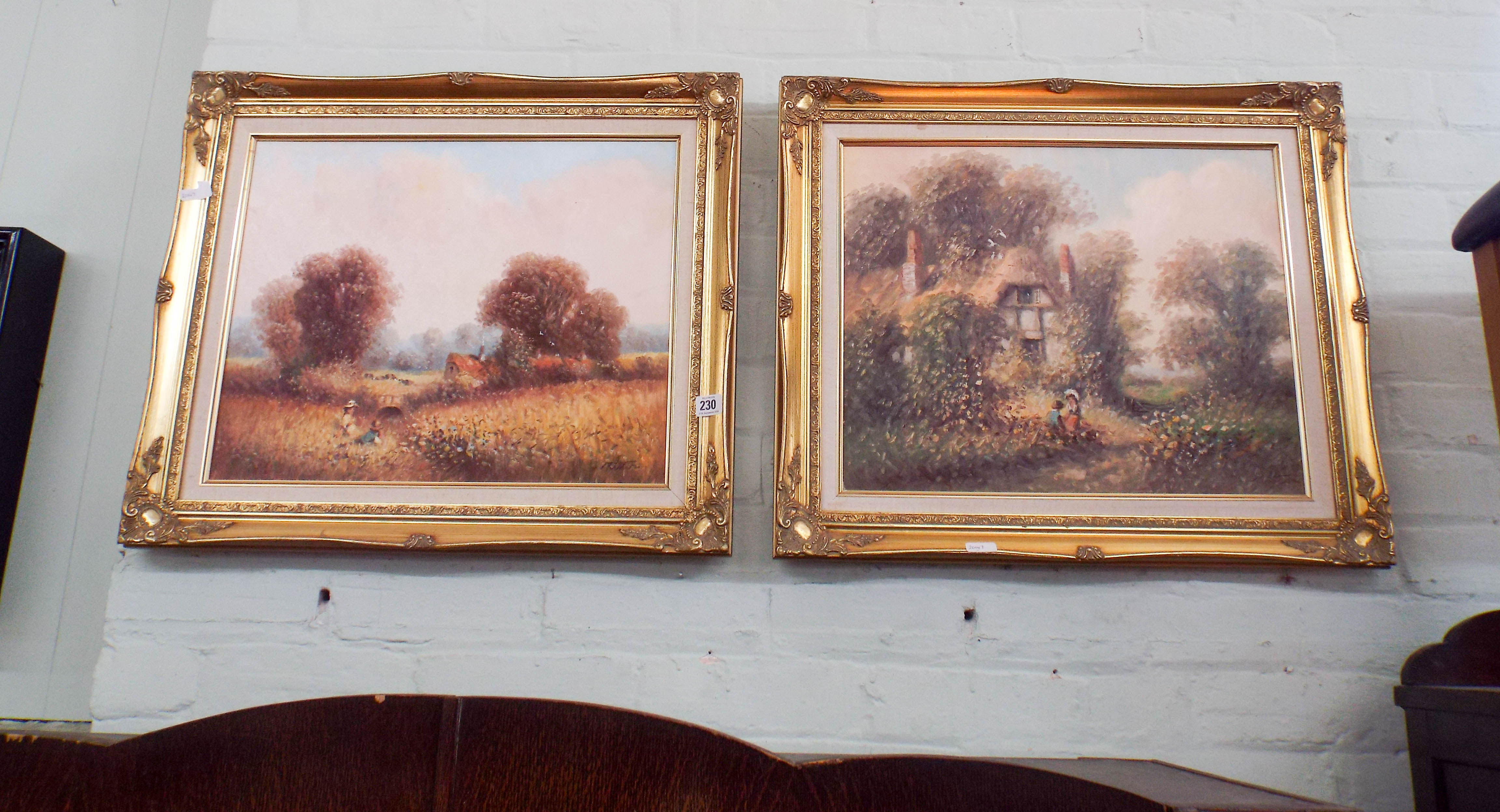 A pair of contemporary oil on canvas landscape paintings in gilt framed signed Ritter