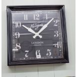 A large rectangular Newgate kitchen wall clock in black case