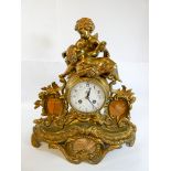 French ormolu gilt bronze figure mounted mantel clock, the case inset with banded agate panels.