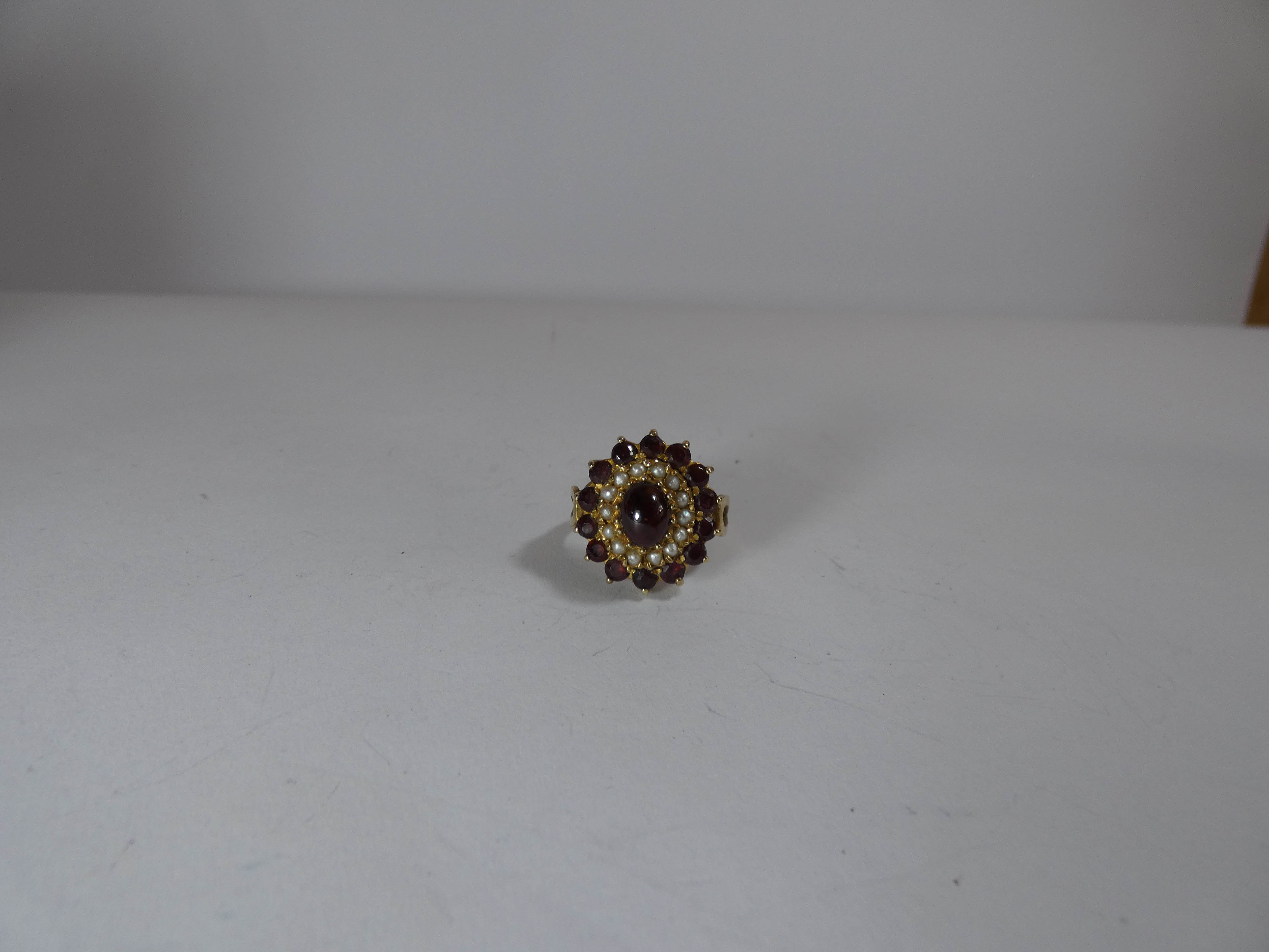 A 9ct gold garnet and seed pearl oval cluster cocktail ring, - Image 2 of 2