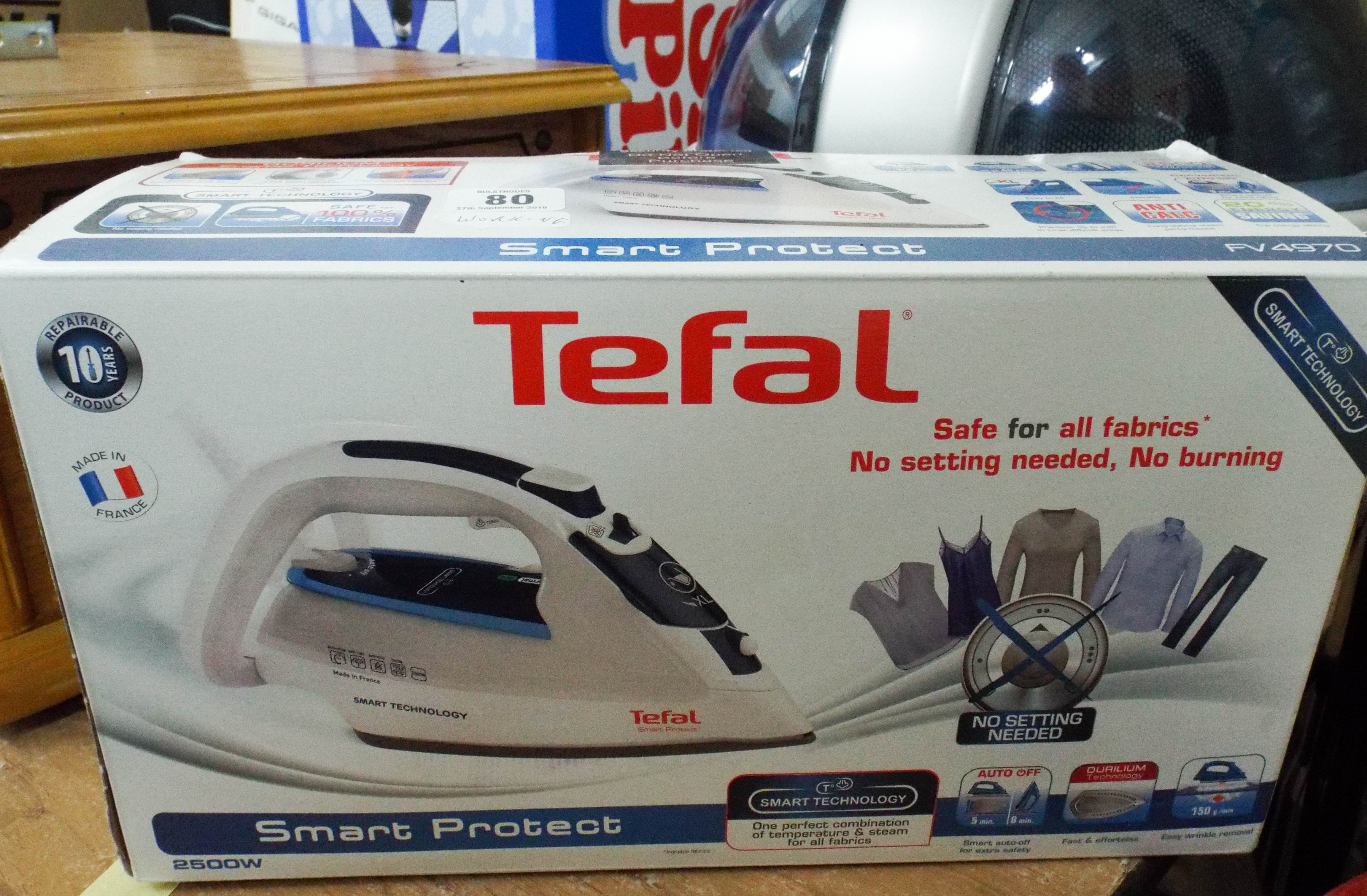 A Tefal smart protect iron in full working order