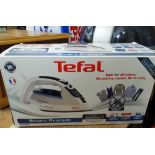 A Tefal smart protect iron in full working order