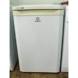 An Indesit work top height fridge