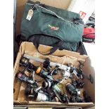 A large Wychwood SPD fishing bag and approximately 9 fixed spool fishing reels