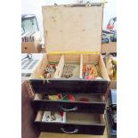 A wooden fishing tackle box with lid and two other drawers with contents and a metal fishing tackle