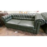 A three seater button back Chesterfield settee in green vinyl