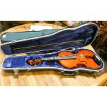 A Violin with bow in hard case