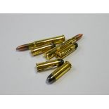 Six brass bullet pen knives