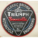 A large Triumph Bonneville cast iron wall hanging plaque