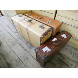 Three various suitcases